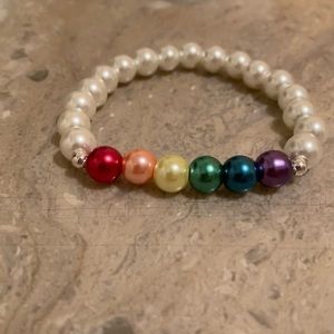 Stretch white rainbow glass pearl (8mm)bead bracelet. 6 1/2” wrist.